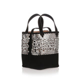 Black eyelet suede bag