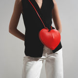 Le Coeur orange leather crossbody bag