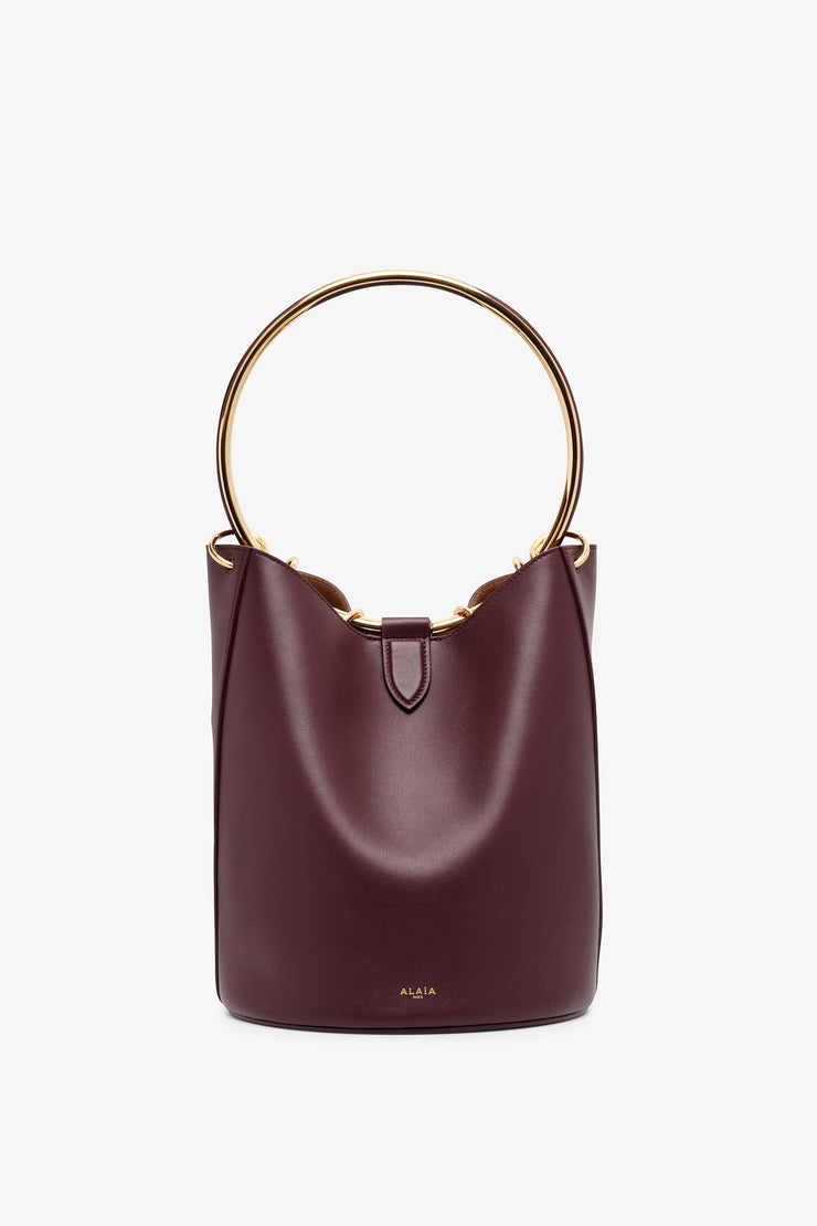 Ring brown leather bucket bag