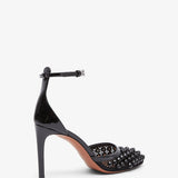 Black mesh pumps
