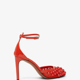 Red studded fishnet pumps