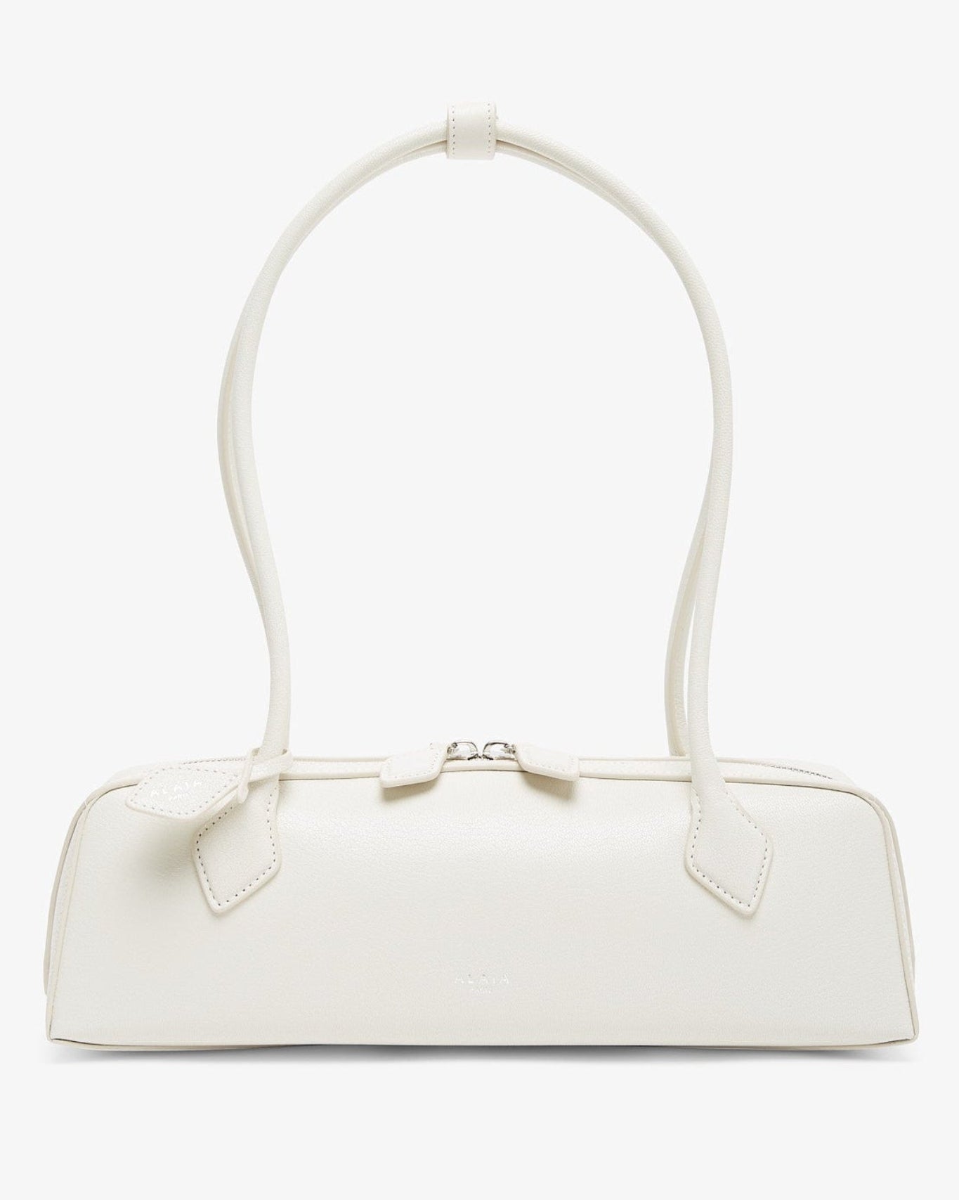 White handbag with a bow detail on a white background