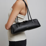 Le Teckel medium black leather bag