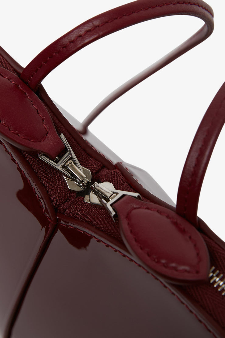 Le Coeur dark red patent crossbody bag