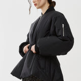 Belted black bomber jacket