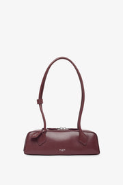 Le Teckel small dark red leather bag