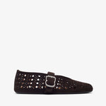 Pair of tan sneakers on a white background