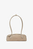 Le Teckel small greige bag