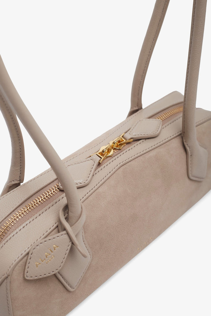 Le Teckel small greige bag