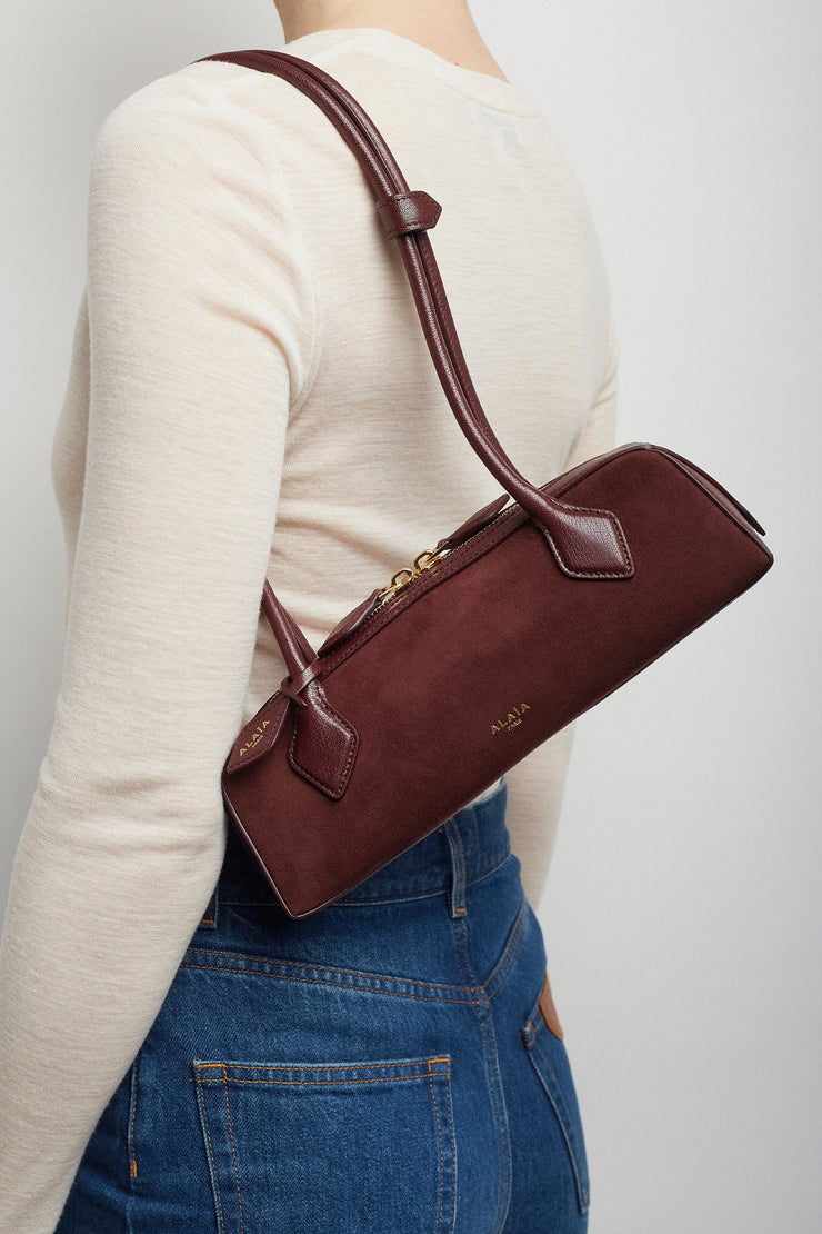 Le Teckel small dark red bag