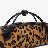Le Teckel leopard brown clutch