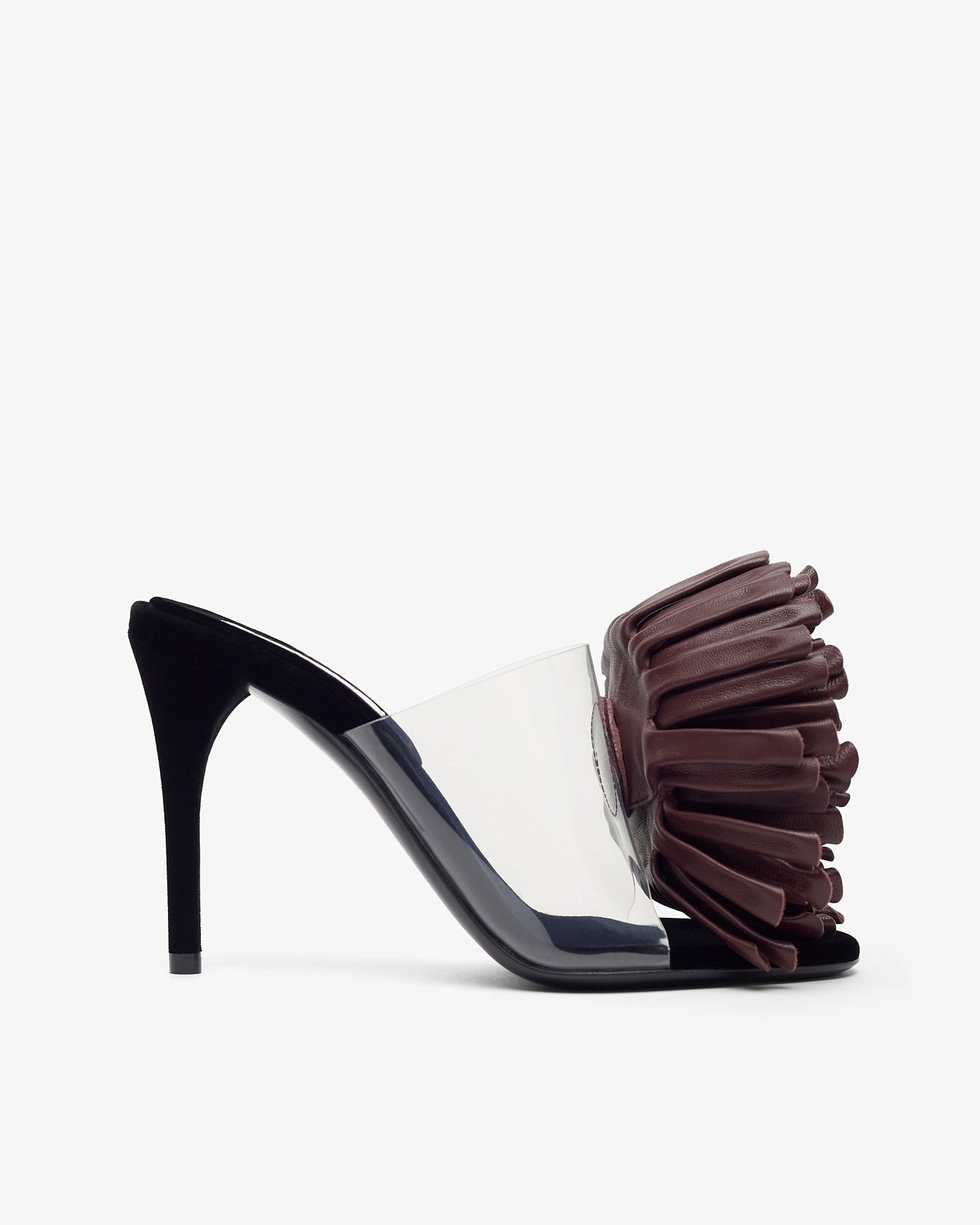 High-heeled shoe with a decorative flower on a white background