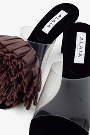 Asymmetric suede pom pom sandals