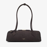 Black handbag with a strap on a white background