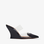 Black high-heeled shoe with clear strap on a white background