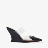 Black high-heeled shoe with clear strap on a white background