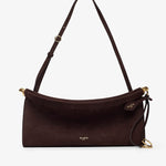 Brown leather handbag with a strap on a white background