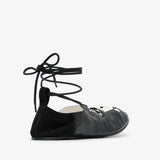 Laced black leather ballet flats