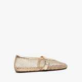 Beige woven flat shoe on a white background