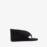 Black wedge sandal on a white background