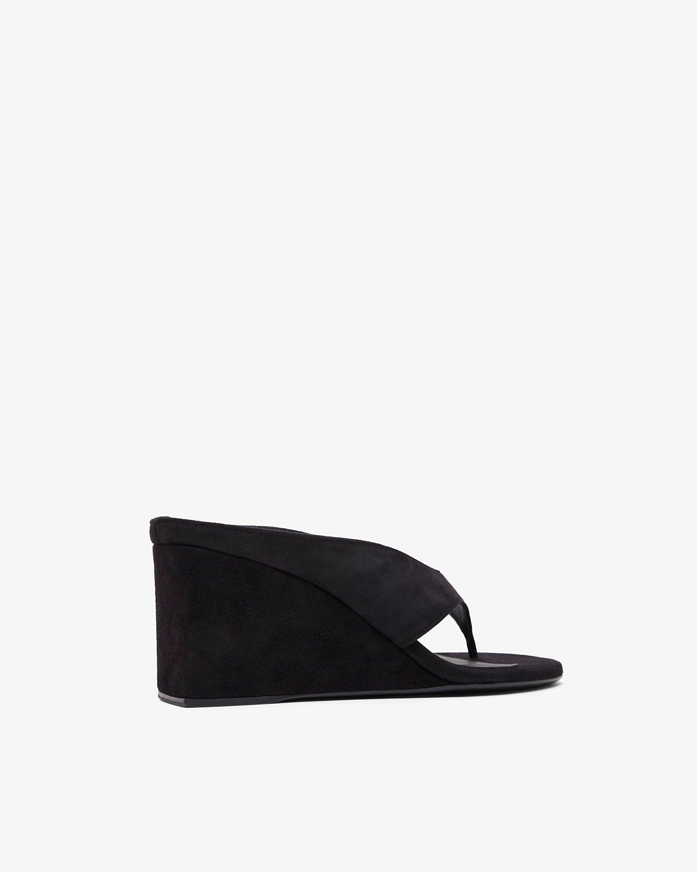 Black wedge sandal on a white background
