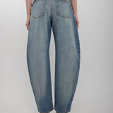 Round faded blue jeans