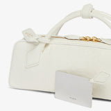 Le Teckel snow white clutch