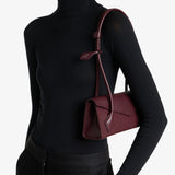 Le teckel flap small leather bag