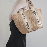 Woody logo white raffia bag