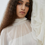 High-low white ruffle top in silk mousseline