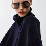 Short dark blue turtleneck cape