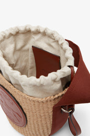 Horse medal brown raffia bucket bag