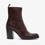 Brown leather ankle boot on a white background