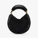 Black woven handbag with a gold handle on a white background