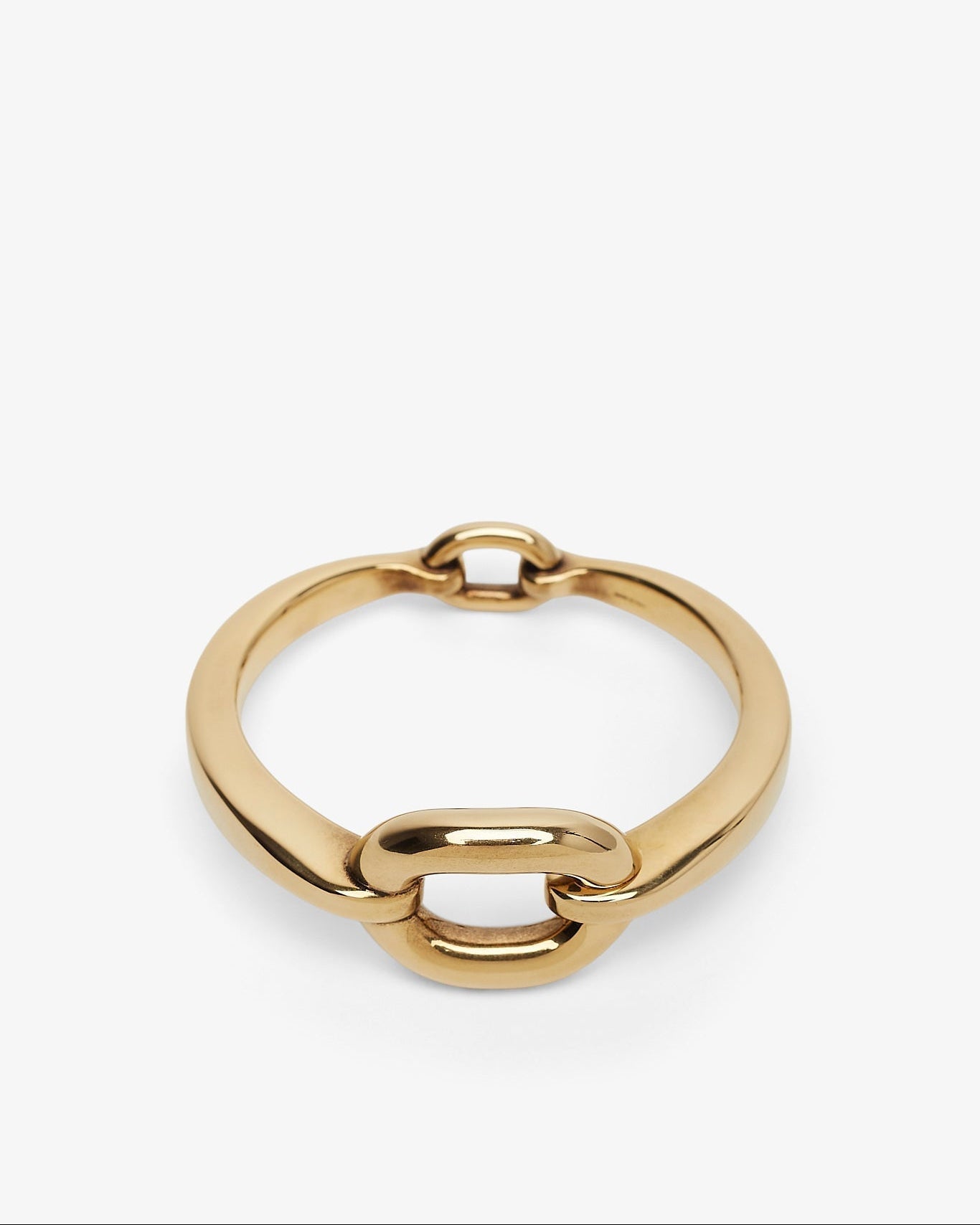 Gold chain-style ring on a white background