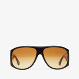 Sunglasses with a black frame and brown gradient lenses on a white background