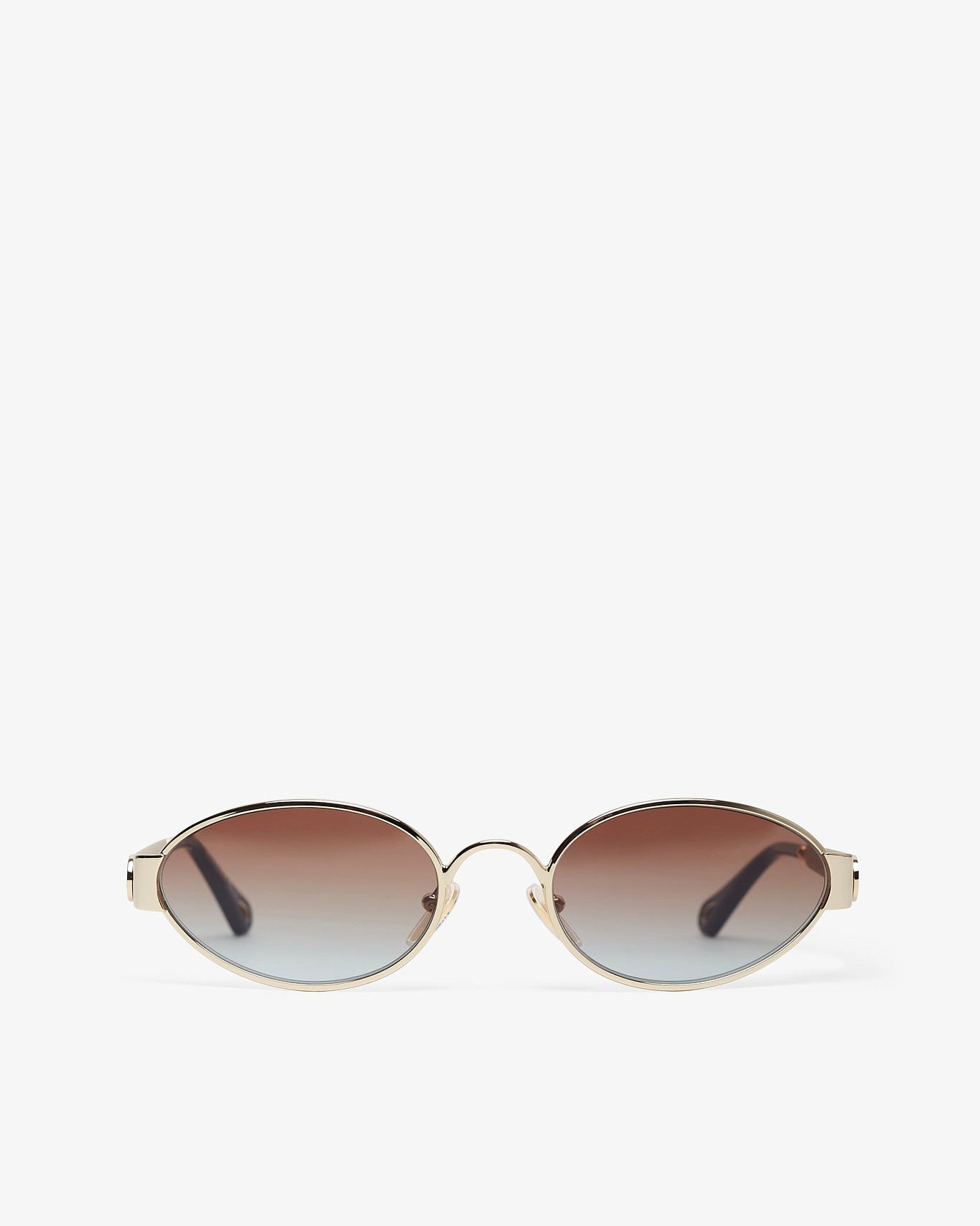 Sunglasses with gradient lenses on a white background