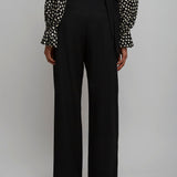 High-waist buckled black trousers