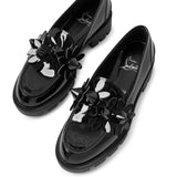 Daisy spikes black patent flats