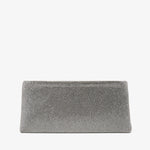 Textured clutch bag on a white background