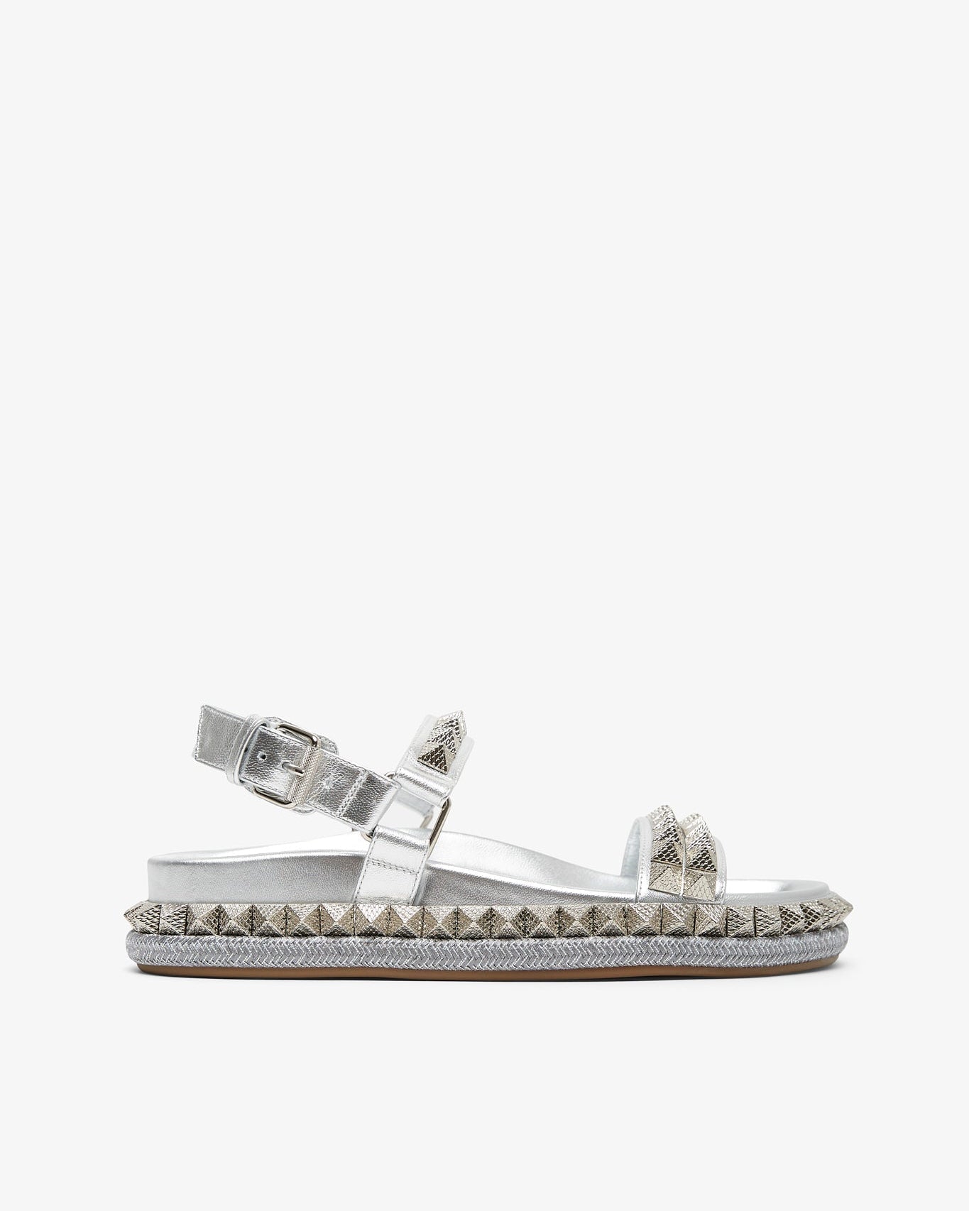 Silver studded sandal on a white background