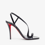 Black high-heeled sandal with red sole on a white background