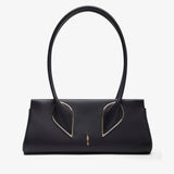 Black handbag with gold accents on a white background
