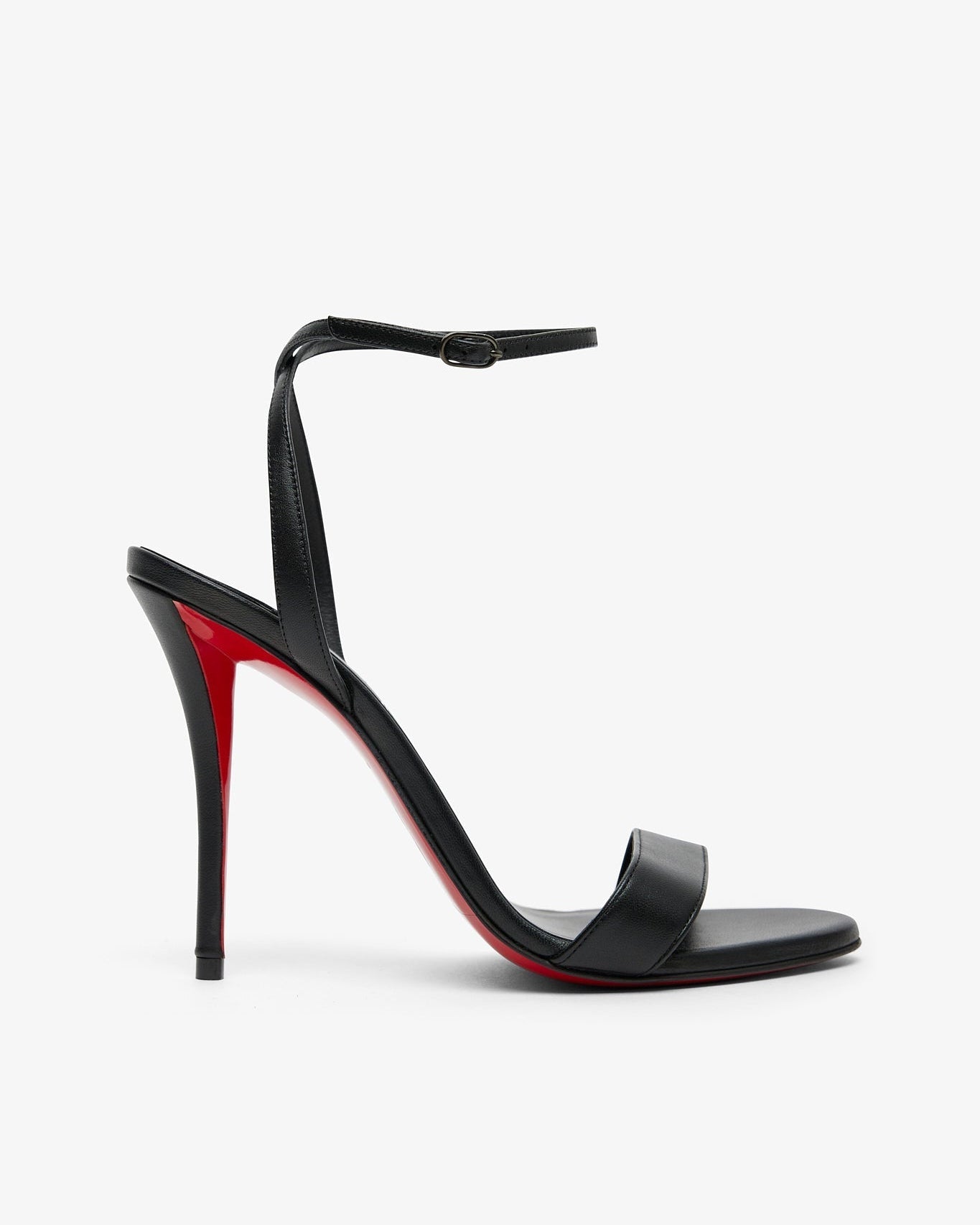 Black high-heeled sandal with red interior on a white background