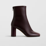Tug oxblood leather ankle boots
