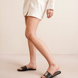4G black and gold flat sandals