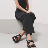 4G strap flat black leather sandals