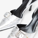 Voyou silver slingback pumps