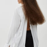 Oversized white shirt in poplin with open back