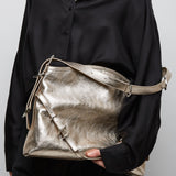 Voyou medium dusty gold bag